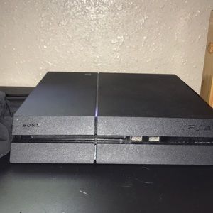Ps4 console, 22 games, and 2 controllers